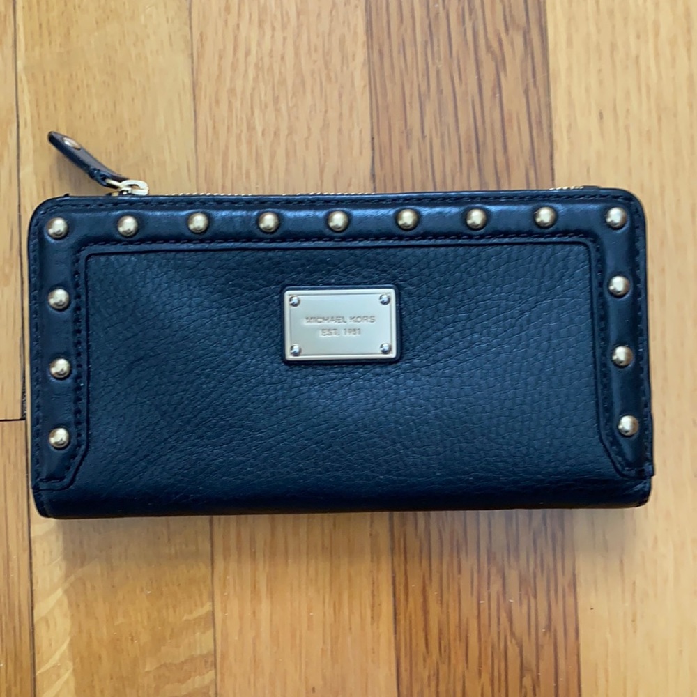 Black leather and gold studded Michael Kors wallet.